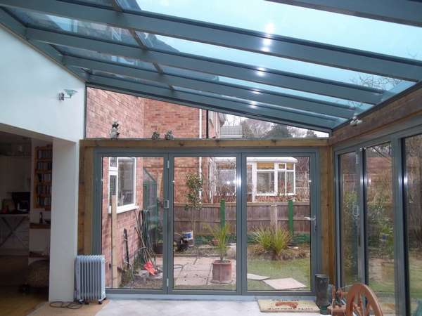 Mr V: Neston South Wirral. Installtion of 4 no Centor C1t Triple glazed Bi fold doors complete with HWL Thermally broken Roof
